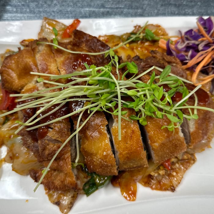 Crispy Duck or Soft Shell Crab Over Drunken Noodles.